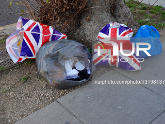 Discarded Union Jack Plastic Bags And Rubbish On A London Sidewalk