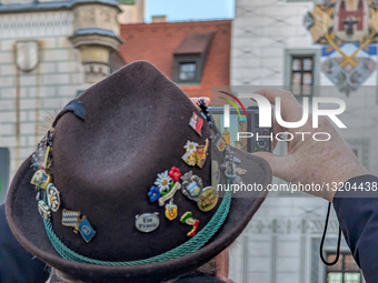 A Tourist Captures The Old Town Hall At Marienplatz In Munich