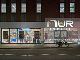 Lidl Supermarket Storefront At Night In London