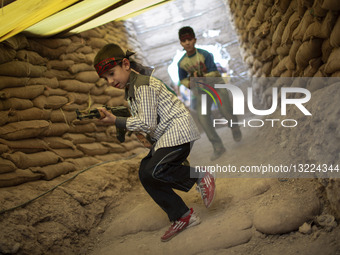 Iran-Children-Reenactment Of A Military Operation