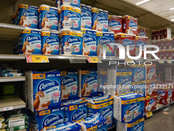 Fully stocked toilet tissue shelves are seen at an H-E-B grocery store in Frisco, Texas ahead of a forecast winter storm.