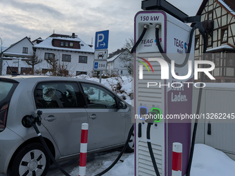 Car Charging At TEAG Mobil Public EV Charging Station