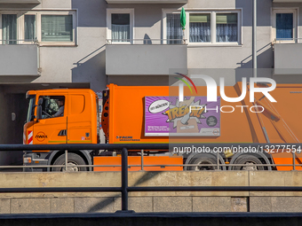 AWM Municipal Waste Management Truck With Glass Recycling Advertisement In Munich