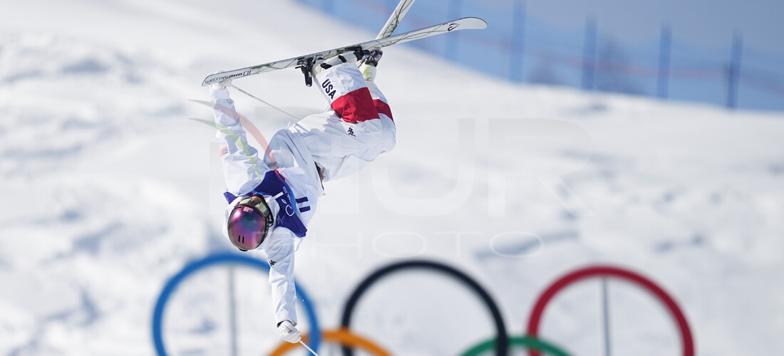 Editorial photography: Cooper Woods (Australia)  celebrates winning gold during the Men's Moguls finals Freestyle Skiing competition on Day 6 of the Milano Cortina...