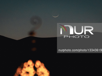 Crescent Moon Marking The Beginning Of Ramadan Over Desert Camp In Merzouga, Morocco