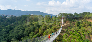 Gallery cover photo: People Cross New Suspension Bridge In Dakshinkali