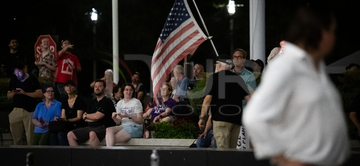 Gallery cover photo: Crowds watch removal of Trump’s name from Kennedy Center