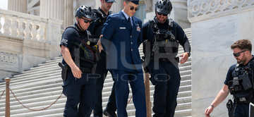 Gallery cover photo: U.S. Air Force officer arrested at Capitol calling for Trump impeachment