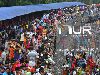 Passengers Travel On Top Of A Train In Bangladesh