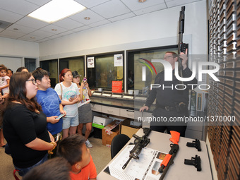 People Take Part In The 33rd National Night Out Program In Los Angeles