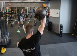 Ukrainian war veterans enter CrossFit tournament in Kharkiv.
