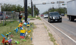 A memorial site set up after a deadly crash killed 8 migrants on Sunday outside a shelter...