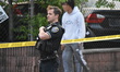Police officer at the crime scene. A shooting occurred in Passaic, New Jersey, United Stat...