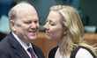 Irish Finance Minister Michael Noonan (L) and Finnish Finance Minister Jutta Urpilainen pr...