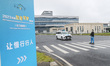 Vehicles take part in a comity slow pedestrian test at the Deqing Intelligent Connected Ve...