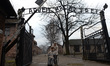 Stanislaw Szpunar (age 93) from Rzeszow, an Auschwitz survivor passes by the main camp gat...