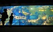 

Visitors are visiting the 6.5-meter-high, 128-meter-long moving digital art exhibition '...