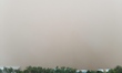 The clear sky is obscured by a sandstorm in Hami, Xinjiang province, China, July 2, 2023. 