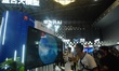 

Visitors are watching a Huawei Pangu Grand model perform complex weather calculations at...