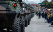 Colombian Army military vehicles and personel take part during the annual parade of the ce...