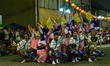 

Dancers are freezing as the music stops during a performance of awa odori in the streets...