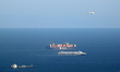 MSC container ship and a Grimaldi Lines ferry at the the port of Barcelona, on 04th August...