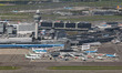 Aerial panoramic view of Amsterdam Schiphol Airport AMS EHAM from a departing airplane win...