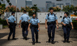 Police officers patrolling outside the legislative council complex on October 25, 2023 in...