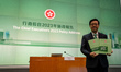 Hong Kong Chief Executive John Lee holding booklets of Policy address before a press confe...