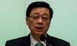 Hong Kong Chief Executive John Lee speaking at a press conference after announcing his pol...