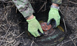KHARKIV REGION, UKRAINE - OCTOBER 24, 2023 - A sapper defuses an anti-tank mine as a conso...