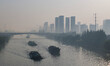 HUAI'AN, CHINA - OCTOBER 26, 2023 - Ships carrying various materials such as coal and buil...