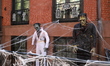 Frankenstein and a Elvis version of the monster are covered in cobwebs outside of a Greenw...