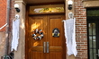 Halloween decorations cover the doorway and staircase of a Gramercy Park townhouse in New...