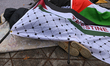 EDMONTON, CANADA - OCTOBER 23, 2023:Pro-Palestinian supporters staging a 'Die-In for Gaza...