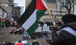 EDMONTON, CANADA - OCTOBER 23, 2023:Pro-Palestinian supporters staging a 'Die-In for Gaza...