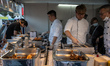 Chiefs preparing food at the Wine and Dine Festival on October 26, 2023 in Hong Kong, Chin...