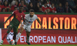 Bruma and Victor Palsson are in action during the Group J - UEFA EURO 2024 European Qualif...
