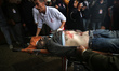 (EDITOR'S NOTE: GRAPHIC CONTENT) Medics are transporting the wounded to Al-Aqsa Hospital i...