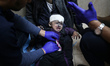 (EDITOR'S NOTE: GRAPHIC CONTENT) Medics are transporting the wounded to Al-Aqsa Hospital i...