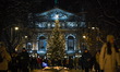 Members of the public are attending the lighting of the Christmas tree, presented by phila...