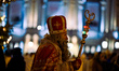 An actor dressed as Saint Nicholas is participating in the lighting of the Christmas tree,...