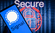 The Signal messenger logo is being displayed on a smartphone with symbols of security and...