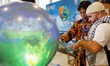 Participants visit Indonesia Pavilion in conference venue, Blue Zone during the COP28, UN...