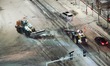 Large machinery is clearing snow on a street in Yantai, Shandong Province, China, on Decem...
