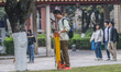 University students are walking on the campus of Xiamen University in Xiamen, Fujian Provi...