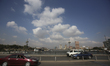 People are walking on the Qasr Al Nile Bridge during a sunny day in Cairo, Egypt, on Decem...