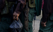 A member of the Zapatista Army of National Liberation (EZLN) in Mexico is carrying a dagge...
