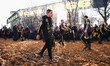 People are attending the Battle of the Oranges during The Historical Carnival of Ivrea in...