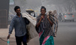 Commuters Are Seen On The Fog Engulfed Road In A Winter Morning In The Eastern Indian Stat...